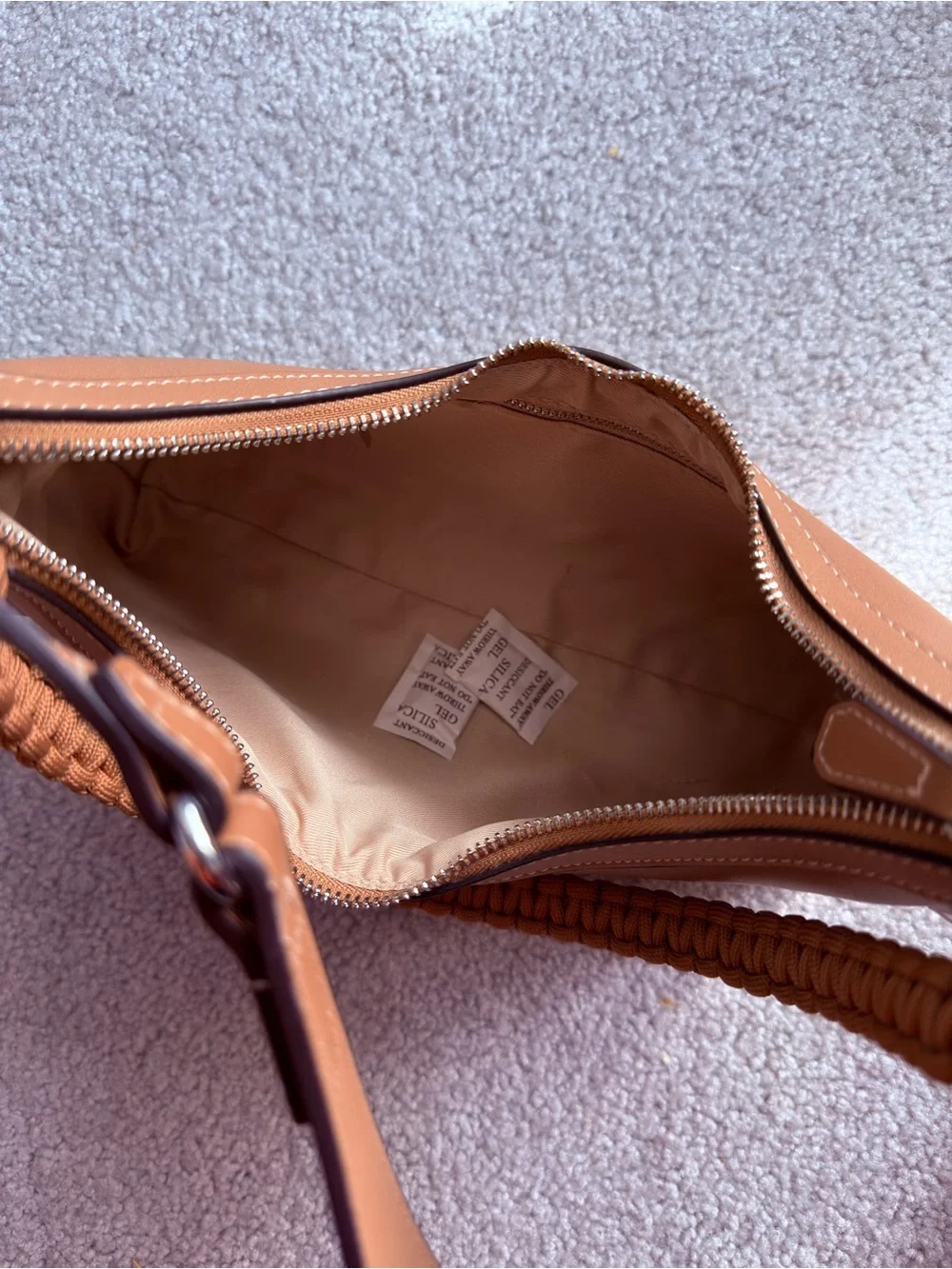 Tommy Bahama Debossed Logo Hobo Bag